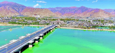 拉萨河迎亲桥、复兴号列车与光储发电项目，看今日西藏巨变